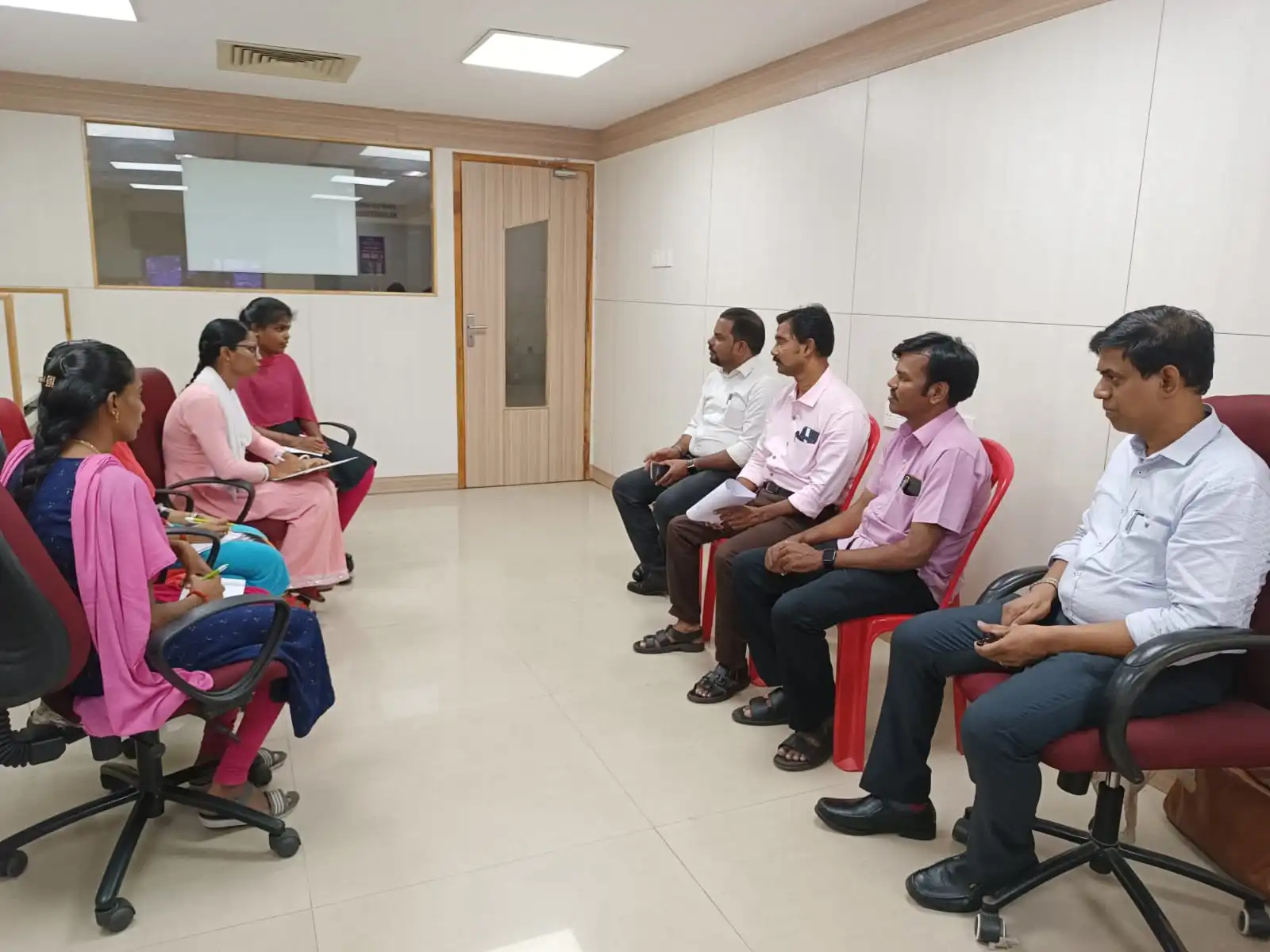 Telecallers Attending Training Session Led by Government Officials - Sree Vignesh Consultancy